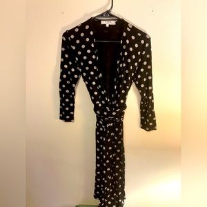 Black and white polka dot wrap dress